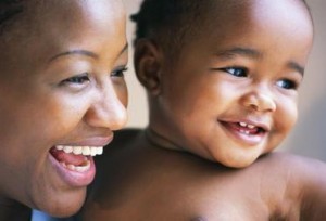 Smiling Mother and Toddler